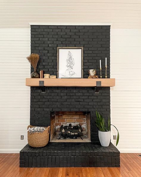 Oak mantle, rustic brakets, DIY black fireplace Decor For White Fireplace, Wood Mantle On Black Fireplace, Black Fireplace Mantel Brick, Mantle Decor Black Fireplace, Black Brick Mantle, Black Fireplace Mantel Decorating Ideas, Matte Black Brick Fireplace, Oak Fireplace Ideas, Black Painted Brick Fireplace Ideas