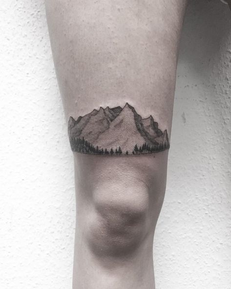 Incredibly detailed, dot-work style mountains and trees tattoo inked above the right knee Watercolor Mountains Tattoo, Small Mountain Tattoo, Trees Tattoo, Tattoo On Thigh, Related Tattoos, Mountain Tattoo Design, Mountains And Trees, Geometric Mountain, 3d Tattoo