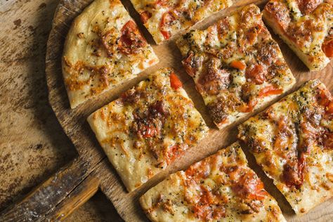 Pour-in-the-Pan Pizza with Tomatoes and Mozzarella Start to finish: 6 hours (35 minutes active) Servings: 4 to 6 The crust for this pizza borrows from the Milk Street recipe for a light, open-crumbed focaccia, our re-creation of the focaccia we encountered in Bari, Italy. The pizza dough is unusual in a couple ways: It uses Pour-in-the-Pan Pizza with Tomatoes and Mozzarella Start to finish: 6 hours (35 minutes active) Servings: 4 to 6 The crust for this pizza borrows from the Milk Street recipe Refrigerated Pizza Dough, Parmesan Salad, Bari Italy, Milk Street, Italian Deli, Artisan Pizza, Pork Loin Roast, Pizza Recipes Dough, Recipe Boards