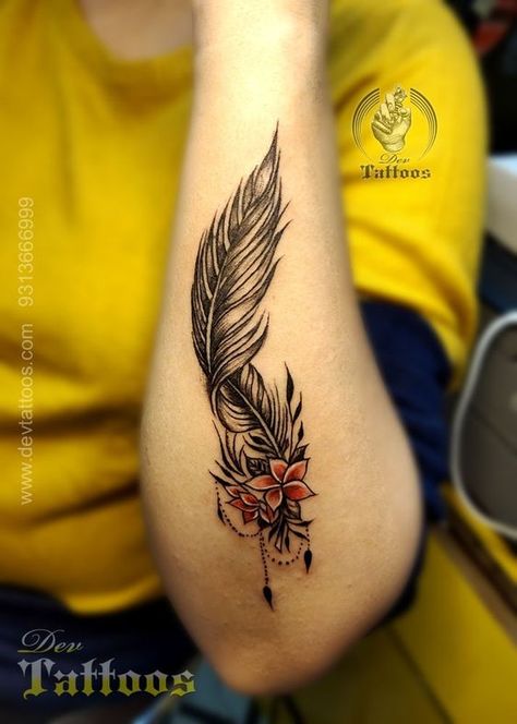 Rate This Tattoo designs From ⭐1~10. SAVE & FOLLOW i will update everyweek. Feather Tattoo With Flowers, Front Wrist Tattoos For Women, Feather Flower Tattoo, 96 Tattoo, Feather Tattoo Arm, Tattoo New, Tattoos To Cover Scars, Feather Tattoo Design, Fire Tattoo