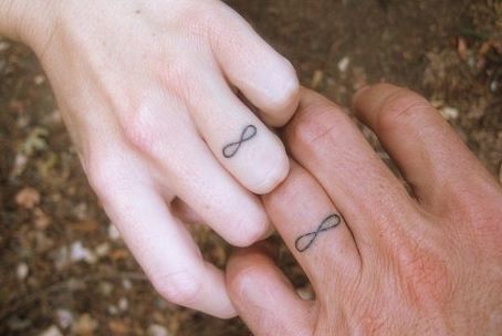 Love it! Coordinating Tattoos, Infinity Ring Tattoo, Infinity Couple Tattoos, Wedding Ring Tattoo, Tattoo Wedding Rings, Delicate Gold Ring, Infinity Tattoos, Cool Wedding Rings, Ring Tattoos