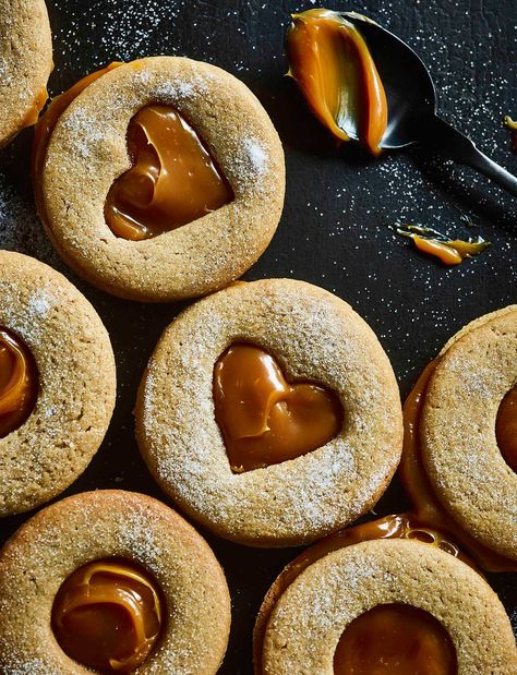 The classic Jammie Dodger gets a 2019 makeover. These salted caramel biscuits make a sweet gift for Valentine’s Day, if you use a small heart-shaped cutter to stamp out the centres Magazine Recipe, Caramel Biscuits, Vegetarian Cookies, Food Vegetarian, Recipe Sweet, World Food, Biscuit Cookies, Cannoli, Photography Awards