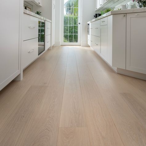 Discover the elegance of European White Oak in our new Mercury shade. Now available in 8” select grade for a truly refined finish. Explore more and get your complimentary samples via the link in bio✨ #JamailHardwoods #HoustonLuxury #WhiteOakElegance #EuropeanHardwood #InteriorPerfection #LuxuryLiving #DesignInspiration #CustomHomes #HardwoodStyle #HoustonInteriors” European Oak Floors, White Oak Kitchen Floors, Classy Flooring, Oak Floor Kitchen, White Oak Flooring, White Oak Kitchen, White Oak Hardwood Floors, Oak Hardwood Flooring, White Oak Floors