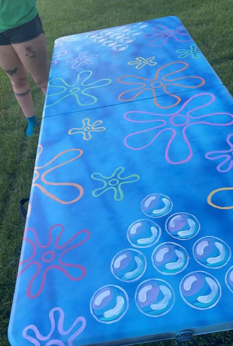 beer pong but make it bikini bottom Spongebob Themed Jello Shots, Spongebob Beer Pong Table, Spongebob Pong Table, Spongebob Outdoor Party, Spongebob Charcuterie, Halloween Beer Pong Table, Spongebob Drinking Game, Spongebob Charcuterie Board, Sponge Bob Themed Birthday Party Ideas