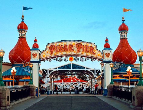 I can't talk re-theming without mentioning the change from Paradise Pier to Pixar Pier. Pixar Pier Aesthetic, Boardwalk Aesthetic, Disney Architecture, Disneyland Aesthetic, Pixar Pier, Concert Stage Design, Planet Coaster, Disneyland California Adventure, Disney Photo Ideas