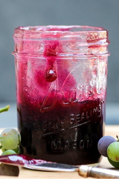 While it's not butter, grape butter is such a delicious jam to make. With vibrant flavors, this sweet topping is perfect for so many things! | wyseguide.com #grapebutter #grapes #grapejam #canning Grape Syrup Recipe, Grape Butter, Grape Jam Recipe, Grape Jam, Grape Recipes, Grape Jelly, Grape Juice, Jams & Jellies, Jam Recipes