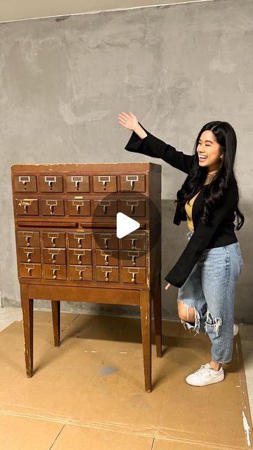 tina le mac 🌙 | DIY + home on Instagram: "This vintage library card catalog cabinet was the deal of a lifetime and I just could not pass it up! 👏🏼

I really wanted to keep some of the wear and tear on it so lightly restoring it was my best option—because there’s no way I was painting over this beautiful wood! But who knows, maybe in the future I will completely refinish it with a complete restoration. For now, all my craft and art supplies have a place to live and I have sooo much more storage in my office/studio! 💛" Library Catalog Cabinet, Library Card Catalog Cabinet Repurposed, Card Catalog Repurposed, Library Card Catalog Cabinet, Vintage Library Card, Card Catalog Cabinet, Library Cabinet, Library Card Catalog, Art Cabinet