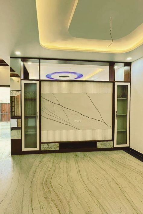 tv unit with glass doors Tv Unit With Glass Doors, Tv Unit Glass Door, Tv Unit Glass, Crockery Unit With Tv Panel, Tv Unit Design Near Main Door, Gold Glass And White Tv Unit, Glass Door Design, Aluminium Kitchen, Unit Design