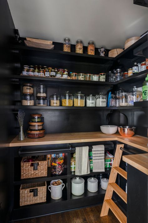 Moody pantry with black open shelves and wood top counters Butcher Block Countertop Pantry, Small Black Pantry, Butcher Pantry Ideas, Wood Shelves In Pantry, Black Pantry Ideas, Black Shelves In Pantry, Open Pantry Kitchen, Industrial Butlers Pantry, Black Pantry Cabinets