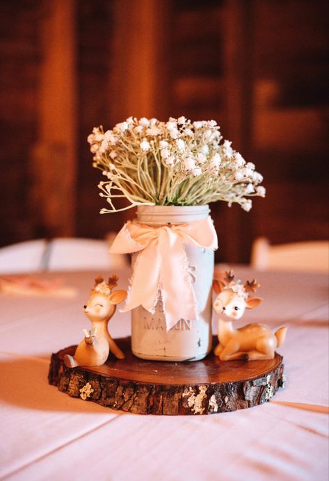 Such a simple & adorable center piece! We used these for our Woodland Girl Themed baby shower in May! Ribbon linked in seperate pin, shop the little deer used here! 🦌🌸 Oh Dear Baby Shower Girl, Woodland Baby Shower Table Centerpieces, Woodland Fairy Baby Shower Ideas, Baby Deer Baby Shower Ideas Girl, Rustic Baby Girl Shower Ideas, Deer Themed Baby Shower Girl, Deer Centerpiece Ideas, Pink Woodland Baby Shower Theme, Bambi Baby Shower Ideas Centerpieces