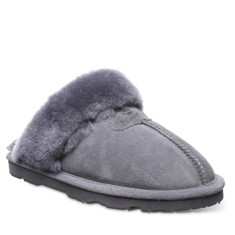 PRICES MAY VARY. Slip-On Sheepskin Lining Comfort sheepskin footbed Lightweight and cushion molded outsole Imported The BEARPAW Loki is a plush way to start your day. These slippers feature soft suede uppers with a sheepskin collar that is easy to maintain and offers the utmost in comfort. Our sheepskin lining regulates body temperature to keep your feet warm, and the sheepskin footbed provides additional softness and reduces foot fatigue. The durable rubber outsole makes this the perfect indoor Bearpaw Slippers, Best Slippers, Women's Slippers, Womens Slides, Bearpaw Boots, Soft Suede, Slide Slipper, Loki, Womens Slippers