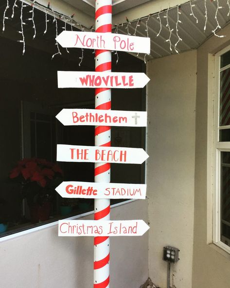 DIY Christmas Sign Post Diy Directional Sign Post Christmas, Christmas Sign Post, Christmas Street Signs, Diy Directional Sign Post, Wooden Sign Posts, Christmas Lamp Post, Christmas Doors, Christmas Signs Diy, Laser Cut Christmas