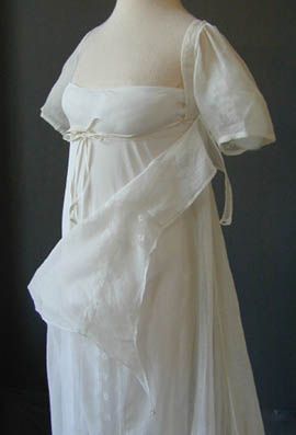 White muslin wedding dress (showing fall-front bodice construction and underdress), English, c. 1805-11. There is a hand written note in ink with this item: "India muslin wedding dress with neckline insertion, worn by my grandmother Hon Jane Elizabeth Wain?, daughter of Lord Headley of Agador, Co Kerry (Ireland) 1811. Lived at Lea Castle, Simmonsbath, Exmoor. Died in Rome." It also says "Wolverley House, Jersey." They probably had two residences. Princesa Sophia, Plus Size Bridal Dresses, Mermaid Ball Gown, Regency Era Fashion, Wedding Bridal Dress, Coquette Fashion, White Ball Gowns, White Mermaid, Regency Dress