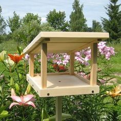 Wood Bird Feeder, 25 Design Ideas for DIY Garden Decorations Diy Garden Decorations, Bird Feeder Station, Bird Feeder Stands, Wood Bird Feeder, Bird Feeder Plans, Wooden Bird Feeders, Homemade Bird Houses, Bird Feeding Station, Bird Houses Ideas Diy