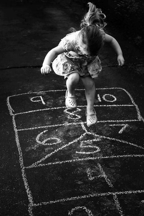 Watching the neighbour's kids play hopscotch in summer makes me happy. McCainAllGood #McCainAllGood Black White Photos, 인물 사진, Little People, White Photography, Black And White Photography, Childhood Memories, Vintage Photos, Kids Playing, Chalk