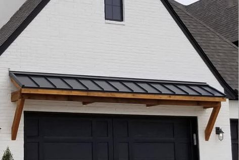 Metal Garage Awning, Standing Seam Metal Awning, Awnings Over Garage Doors, Garage With Awning, Modern Farmhouse Awning, Metal Eyebrow Over Garage, Metal Roof Awnings, Shed Porch Roof Ideas, Metal Roof Awning Over Door