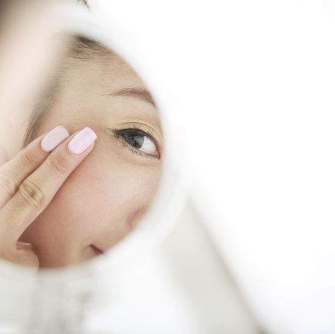 how to care for eye skin - young woman looking at self in mirror skin care Looking At Self In Mirror, Self In Mirror, Niacinamide Products, Swollen Eyes, Tear Trough, Retinol Eye Cream, Injectables Fillers, Olay Regenerist, Feeling Better