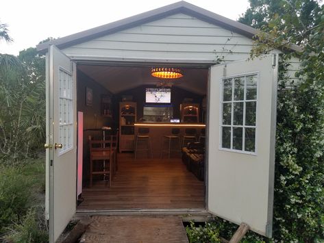 Pub shed, built for $500 Naples, FL Man Shed Ideas Backyards, Shed Pub Ideas, Backyard Pub Shed, Backyard Shed Bar Ideas, Shed Pub, Home Pub Ideas, Tiki Backyard, Backyard Pub, 12x24 Shed