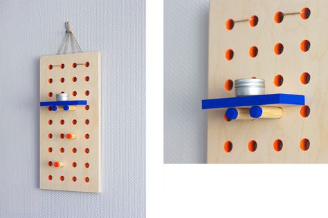 A handmade fluorescent wall organiser. The set contains 3 boards, shelves of 4 different sizes and 40 pegs for holding them and hanging stuff. Peg Board Office, Peg Board Design, Peg Board Ideas, Peg Board Shelves, Peg Board Walls, Pegboard Wall, Peg Wall, Interactive Walls, Cnc Furniture