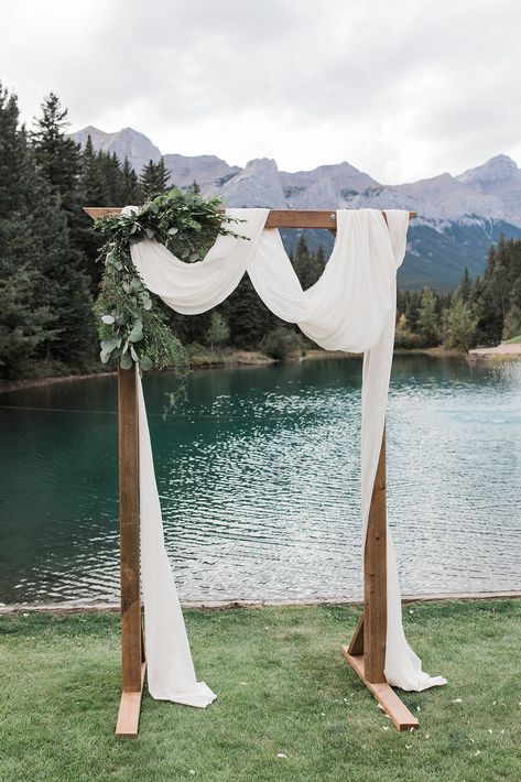 Wedding Arch Ideas Forest, Arch With Greenery Wedding, Eucalyptus Wedding Arch Simple, Emerald Green Arch Wedding, Green Wedding Arch Outdoor Ceremony, Minimalist Wedding Arbor, Diy Fall Wedding Arch, Wooden Ceremony Arch, Wedding Arch Without Flowers