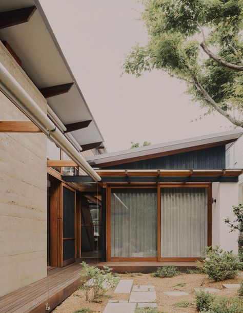 This Accessible Home Beautifully Channels Japanese Architecture Australian Architecture Residential, Genkan Entrance, Modern Japanese House Exterior, Upstate House, Accessible Home, Street Appeal, Modern Japanese Architecture, Timber Staircase, Coastal Architecture