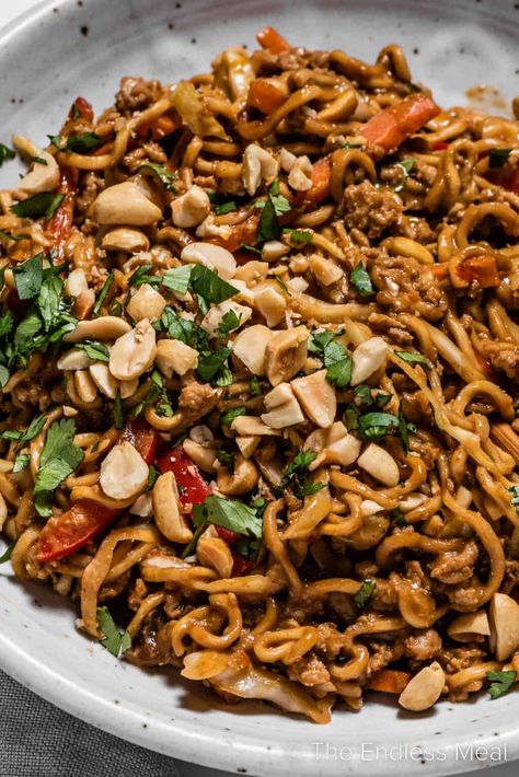 These saucy Thai peanut chicken noodles are a quick and delicious weeknight meal. They're loaded with ground chicken, ramen noodles, and vegetables then smothered in a creamy homemade peanut sauce. They're healthier than takeout, and they're ready in just 25 minutes! #theendlessmeal #peanutnoodles #thainoodles #noodles #chickennoodles #thaichicken #pasta #dinner #easydinner #thai Ramen Noodle Sauce, Ground Chicken Ramen, Chicken Peanut Noodles, Thai Chicken Peanut, Peanut Chicken Noodles, Chicken Ramen Noodle Recipes, Thai Recipes Noodles, Thai Chicken Noodles, Thai Peanut Noodles