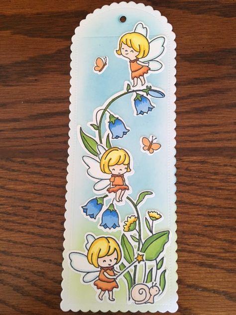 Bookmark was made with HB "Fairy Garden" stamps and dies. Background was inked with distress inks. Hello Bluebird, Cookie Sticks, Book Marker, Felt Bookmark, Diy Crafts Bookmarks, Bookmark Ideas, Bullet Journal Paper, Handmade Bookmarks, Creative Bookmarks