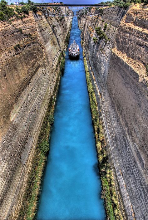 GREECE CHANNEL | The Isthmus Canal by ^StamatisGR on deviantART.    The Isthmus of Corinth is the narrow land bridge which connects the Peloponnese peninsula with the mainland of Greece, near the city of Corinth. The word "isthmus" comes from the Ancient Greek word for "neck" and refers to the narrowness of the land. Since 1893 the Corinth Canal has run through the 6.3 km wide isthmus, effectively making the Peloponnese an island. Corinth Greece, Corinth Canal, Places In Greece, Alam Yang Indah, Greece Travel, Macedonia, Places Around The World, Albania, Ancient History