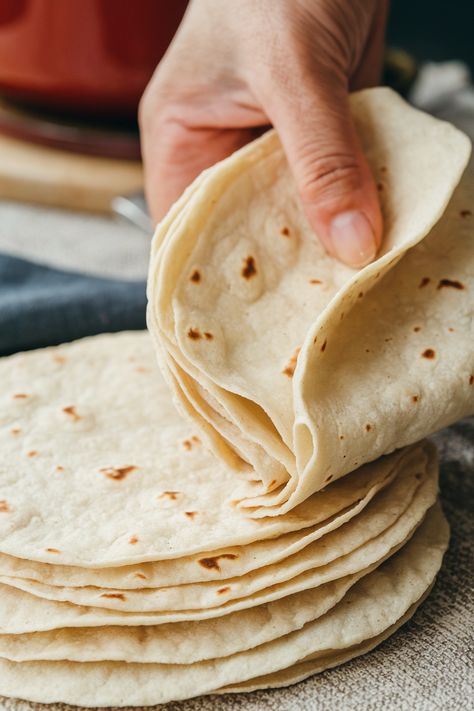 Soft, pliable, and sturdy, these homemade flour tortillas are perfect for tacos, burritos, enchiladas, and more! 🥙✨ Made with just 5 simple ingredients, they’re easy to whip up in under an hour. Whether you use a stand mixer or mix by hand, you’ll love how fresh and delicious these tortillas taste. 🌮 #FlourTortillas #HomemadeTortillas #MexicanRecipes #EasyRecipes #TacoTuesday #FromScratch Easy Flour Tortillas, Loaded Deviled Eggs, Soft Tortilla Recipe, Enchiladas Burritos, Tortillas Homemade, Tortillas From Scratch, Homemade Burritos, Easy Tortilla Recipe, Flour Tortilla Recipe