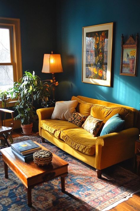 7 Warm Paint Colors to Make Your Living Room Feel Inviting Home Painting Ideas Living Room Small Spaces Wall Colors, Ceiling Different Color Than Walls, Boho Home Paint Colors, Blue And Orange Living Room Color Scheme, Bold Interior Paint Colors, House Colors Interior Ideas Living Rooms, Teal Living Room Walls, 70s Paint Colors, Mustard Paint Color Walls