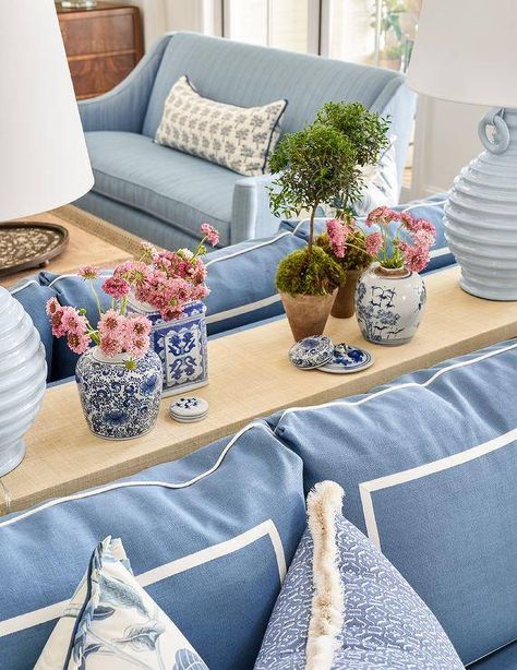 Lamps Behind Sofa, Blue Tufted Sofa, Blue Upholstered Bed, Beadboard Trim, Jenkins Interiors, Blue Family Rooms, Sofa Design Ideas, Black Sofa Table, Behind Sofa