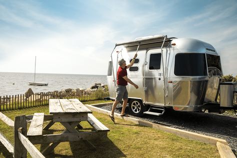 The 2021 Airstream Caravel Camper (with YouTube RV Tours of Every Model) If you want one of the most classic RVs out there, you want an Airstream. Airstream is practically a household name, even among non-RVers. These classy, shiny travel trailers stand out from the crowd. But this year’s Airstream Caravel takes things even further. […] The post The 2021 Airstream Caravel Camper (with YouTube RV Tours of Every Model) appeared first on Drivin' & Vibin'. Airstream Caravans, Airstream Caravel, Airstream Bambi, Airstream For Sale, Aluminum Trailer, Unique Floor Plans, Luxury Rv, Buying An Rv, Small Fridges