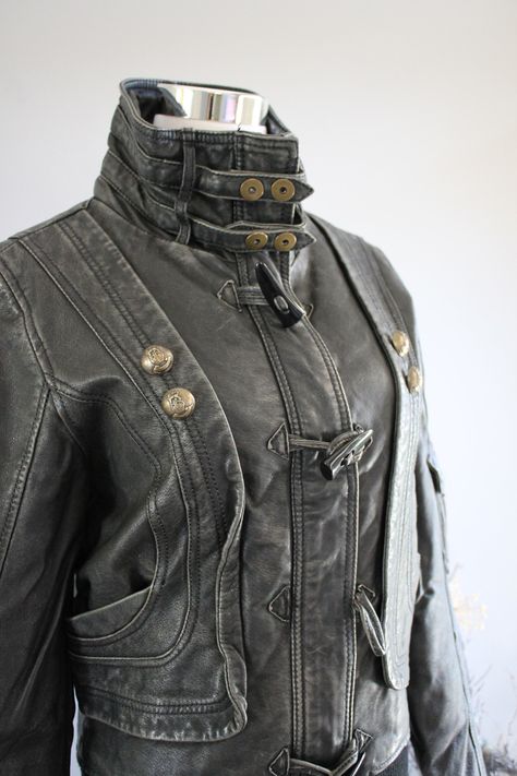 Genuine Leather Black Grey  Bomber Jacket Motorcycle Leather Jacket Tall Neck Soft Leather Cotton Lining Size XS Vintage 90s #O167A ✂----- F e a t u r e s---------------- * genuine leather jacket * metal zipper closure * toggle buttons * high neck with snap button * grey plaid cotton lining * 2 front pockets * Made in Nepal * condition : Good (Missing one button but doesn't affect the functionality as the zipper will be the main closure) ✂------ M e a s u r e m e n t s -------- Measured with gar Different Types Of Leather Jackets, Leather Jacket Runway, High Neck Jacket, Chic Grunge, Vintage Leather Jackets, Biker Jackets, Metal Jacket, Metallic Clothes, Jacket Vintage