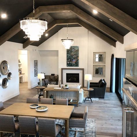 Amy Adams on Instagram: “Want to add drama to a large space with vaulted ceilings? Try a black painted ceiling with light stained beams! White walls are a must to…” Dark Stained Beams Ceilings, Dark Paint Vaulted Ceiling, Black Walls Wood Ceiling, Vaulted Ceiling Living Room Paint Wall Colors Exposed Beams, Black Ceiling With Beams, Black Beams White Ceiling, Black Ceiling Beams Living Room, Black Cathedral Ceiling, Dark Painted Ceiling Living Room