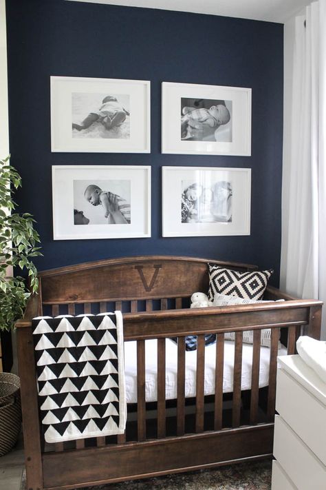 Nursery Room Babyboy, Nursery With Navy Crib, Nursery With Dark Wood Crib, Nursery Navy Accent Wall, Navy Grey Nursery, Navy Blue And Brown Nursery, Navy And Wood Nursery, Navy Wall Nursery, Dark Walls Nursery