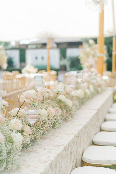 Head table pale pink and white flower runner with babies breath and roses. Charleston destination wedding reception decor. Charleston destination wedding photographer. Floral Table Runners Wedding, Pink Fall Wedding, Blush Pink Wedding Centerpieces, Fall Destination Wedding, Baby's Breath Wedding Flowers, Head Table Wedding Decorations, Save Wedding, Downtown Charleston Sc, Flower Runner