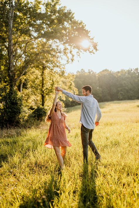 Engagement and couple photos poses and inspiration. Poses in a field and woods. Field and woods location for engagement pictures. Summer engagement pictures and ideas. Chattanooga, Tennessee. Chickamauga Battlefield. Summer engagement picture locations in the woods and outdoors Twirling Couple Pictures, Tennessee Engagement Pictures, Twirl Engagement Photo, Cute Couple Outdoor Pictures, Field Picture Ideas Couple, Couple Picture Ideas Outside, Couple Poses For Fall Pictures, Engagement Photos Flowy Dress, Engagement Field Pictures