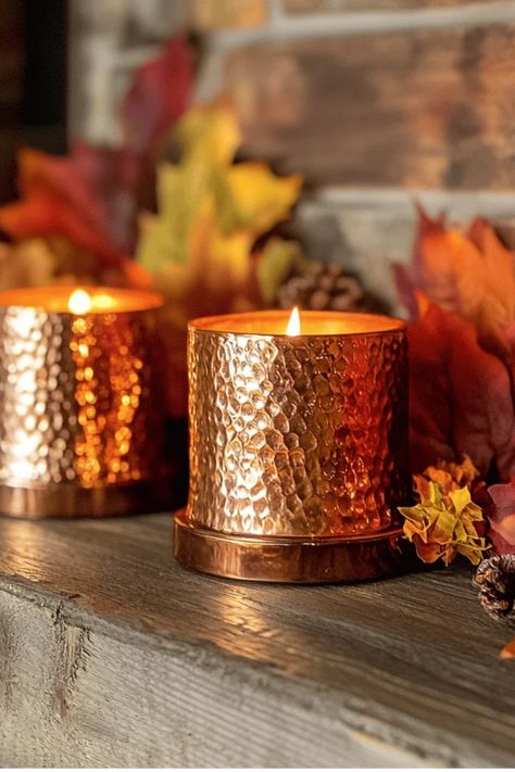 Elevate your fireplace for fall with vintage copper accents. Discover how to create a cozy focal point in your living room this autumn. #FireplaceDecor #CozySeason Some of the links in my articles are affiliate links. If you make a qualified purchase from one of my links I will make a small commission at no cost to you. Thank you for your support!!! Warm Fall Decor, Cozy Autumn Home, Backyard Firepit Area, Copper Living Room, Copper Tea Kettle, Copper Candle, Rustic Pumpkin, Rustic Coastal, Copper Planters