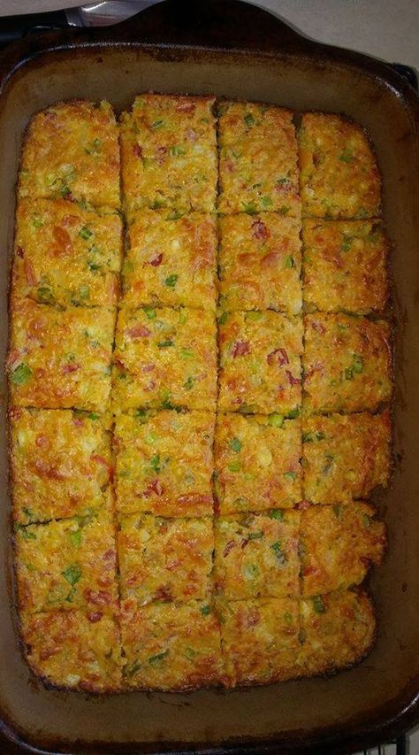 Crawfish Cornbread  1 box Jiffy (do not make according to directions on box!!!)  3 eggs  1 stick of butter, melted  1 cup chopped green onion  1 cup chopped white or yellow onion  1 can rotel tomatoes, drained  2 handfuls grated cheese of choice (I like Colby Jack or Pepper Jack)  1 lb crawfish tails (I coarsely chop mine)  Mix all ingredients. Pour into a greased 9x13 pan. Bake at 350 for 40-50 minutes. Crawfish Cornbread Dressing, Cajun Cornbread, Crawfish Dishes, Crawfish Cornbread, Crawfish Bread, Cajun Recipes Authentic, Crawfish Recipes, Cajun Crawfish, Cajun Dishes