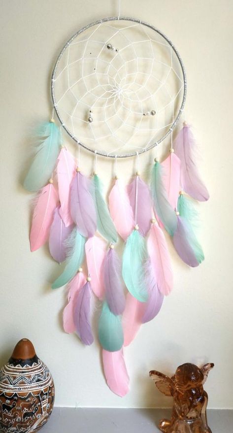 his beautiful white gold feather dream catcher is the perfect eye-catching piece you need for your home. It also perfect for a baby nursery, bedroom wall decor, bohemian/tribal home decor. The dream catcher ring width 9 inches ( 23 cm.) Overall length including hanging loop 31 i This large dream catcher is made of a metal ring wrapped in a silver ribbon. #dreamcatcher #babyshower #nurserydecor #bohobedroom #bohodecor #feathers #largedreamcatcher #bohonursery #walldecor #unicorndreamcatcher Unicorn Dream Catcher, Dream Catcher Pink, Atrapasueños Diy, Gold Nursery Decor, Doily Dream Catchers, Diy Dream Catcher Tutorial, Dream Catcher Tutorial, Dream Catcher Patterns, Blue Dream Catcher