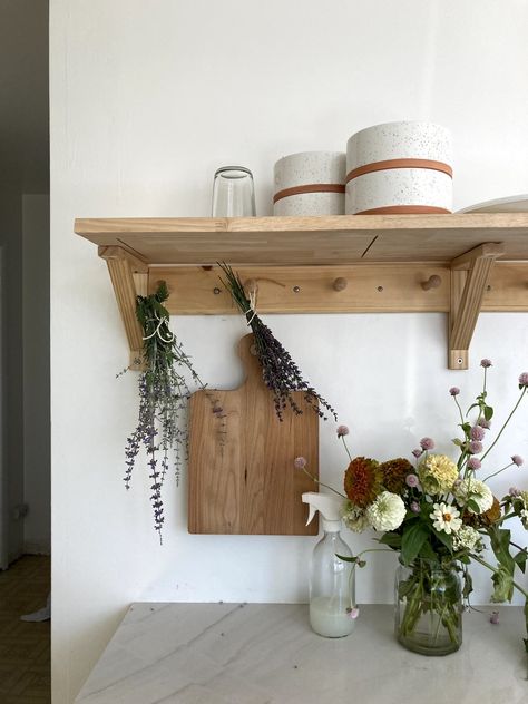 Kitchen Wall Shelf Ideas Wood, Shaker Shelf With Pegs, Peg Rail Shelf Kitchen, Shelf With Pegs Decor, How To Make A Peg Shelf, Peg Shelf Kitchen, Diy Wood Corbels Shelf Brackets, Laundry Room Organization Open Shelves, Corbel Shelf Diy