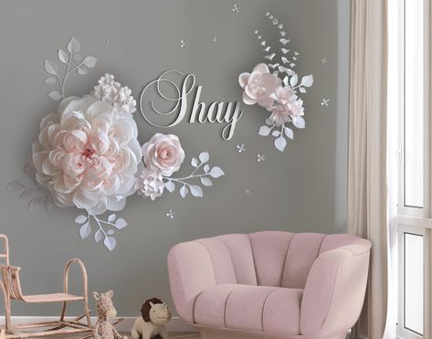 "Large paper flowers for wall decor around baby name sign placed above a crib is a lovely idea for nursery. This set of blush, pink and white paper flowers deeply amazes everybody who see it, because it is implemented by the most luxurious flowers - peonies. What could be softer and more sophisticated than pinkish white foam of hundreds petals assembled into exquisite posh peonies? All these ball shaped forms of fully and half opened flowers with buds magnetize your eyes and make our hearts melt Flower Wall For Nursery, Flower Decals For Walls, Name Sign With Flowers, Paper Wall Flowers, Paper Flowers Large, Luxurious Flowers, Peony Nursery, Large Paper Flower, Blush Pink Nursery