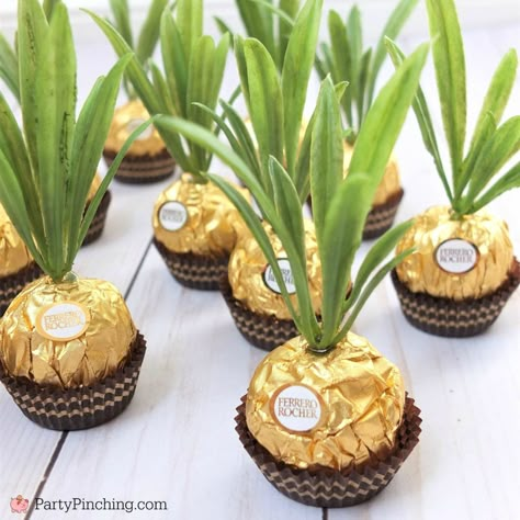 Ferrero Rocher Pineapples are so adorable and this DIY craft is so easy to make for a cute and fun party favor for a luau, beach, or pineapple party Pineapple Party Favors, Diy Pineapple, Pineapple Theme, Pineapple Birthday, Pineapple Party, Hawaiian Party Decorations, Wedding Favors And Gifts, Luau Theme Party, Hawaiian Luau Party