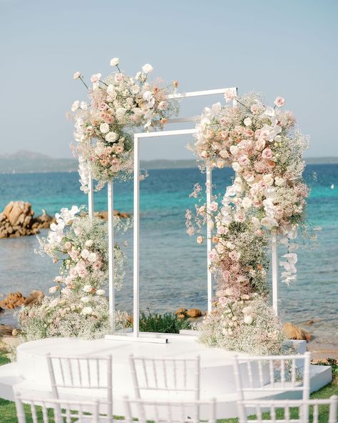 A Seaside Wedding in Sardinia Featured Pastel Tones✨ Denise and Paul celebrated their love with a picturesque wedding in Sardinia, an island they both cherish deeply. Their wedding in a private garden overlooking the beach embodied glamour and romance, featuring soft pastel decorations inspired by the delicate beauty of clouds. @sara_carboni_events masterfully orchestrated the event, ensuring every detail reflected the couple’s vision and exceeded their high expectations, making the day tru... Pastel Decorations, Beachfront Wedding, Boho Wedding Ceremony, Story Planning, Backdrop Frame, Pastel Decor, Seaside Wedding, Luxury Destination Wedding, Destination Wedding Planning