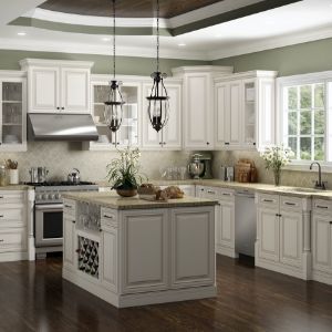 The Wilora Hawthorne Wildwood Antique White collection features an intricately beveled raised panel design on the doors. To further emphasize these design features, a dark hand-glaze is applied to add just a touch of contrast and dimensions that elevates the style of the cabinet. This collection works well with traditional or classic designs given its intricate door design. | Wildwood Antique White Cabinets by Wilora Hawthorne White Cabinets, Cabinets Bathroom, Base Cabinet, Bathroom Cabinets, Drawer Fronts, Antique White, Kitchen And Bath, Design Services, Kitchen Design