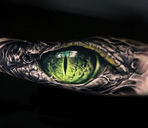 Awesome 2 colors realistic tattoo style of Aligator Eye motive done by tattoo artist Vainius Anomaly | Post 25443 | World Tattoo Gallery - Best place to Tattoo Arts Crazy Forearm Tattoo Men, Tattoo Biceps, Alligator Tattoo, Reptile Eye, Herren Hand Tattoos, Eyeball Tattoo, Sick Tattoo, Stylish Tattoo, Scary Tattoos