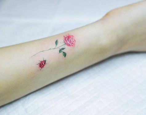 Small pink rose and ladybug tattoo on the inner forearm. Small Nature Tattoo, Ladybug Tattoo, Pink Rose Tattoos, Lady Bug Tattoo, Small Forearm Tattoos, Bug Tattoo, Insect Tattoo, Delicate Tattoo, Memorial Tattoos