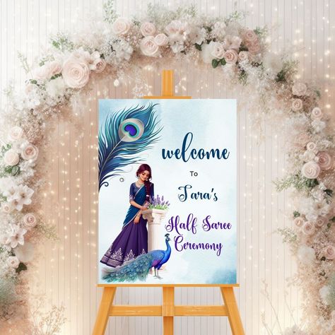 Announcing our new half saree ceremony welcome sign template in peacock theme! 🎉✨ Infuse your event with the richness of tradition and the beauty of these vibrant hues. Customize this stunning design to welcome your guests with grace and style. Download now and let the enchantment begin! #halfsareeceremony #halfsareeceremonywelcomesign #pubertywelcomesign #pubertyceremony #pubertysign #halfsareeceremonysign Click link in bio to shop this design. Half Saree Ceremony, Ceremony Welcome Sign, Saree Ceremony, Saree Function, Half Saree Function, Peacock Theme, Welcome Sign Template, Joyous Celebration, Ceremony Signs