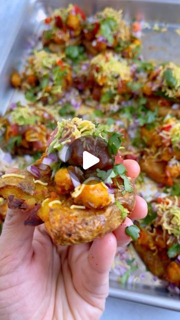 HETAL DESAI |MyVegetarianRoots on Instagram: "SMASHED POTATOES CHAAT - crispy baked baby smashed potatoes topped with chana masala, minty spicy green chutney, sweet tangy tamarind chutney and fresh crunchy toppings. Just a perfect colorful bite for Holi!!

Head over to my blog for detailed step by step recipe
https://myvegetarianroots.com/smashed-potatoes-chaat/
Clickable link in my bio @myvegetarianroots

#smashedpotatoes #smashedpotatochaat #potato #chaat #potatochaat #aloochaat #fastfood #indianfoodusa" Palak Patta Chaat, Potato Chaat, Crunchy Toppings, Fried Spinach, Tamarind Chutney, Chaat Recipe, Green Chutney, Smashed Potatoes, Spinach Leaves