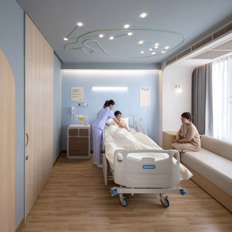 Integrated Field decorates children's hospital with slides and a pool Hospital Architecture, Hospital Room Aesthetic, Healthcare Interior Design, Arsitektur Masjid, Children Hospital, Hospital Interior, Four Rooms, Hospital Room, Hospital Interior Design